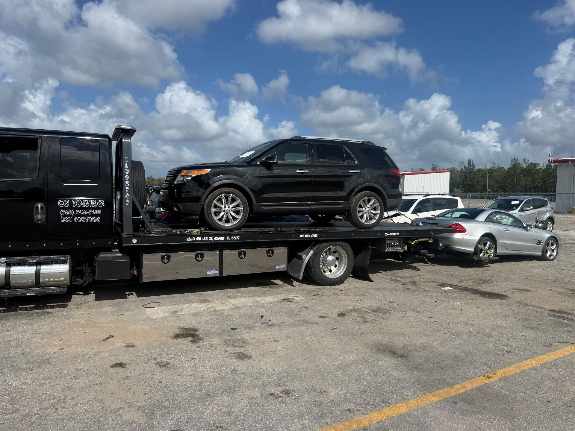 CG Towing transporting an SUV